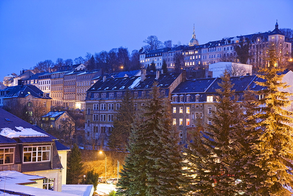 Snow covered houses in the evening, Annaberg-Buchholz, Arz mountains, Saxony, Germany