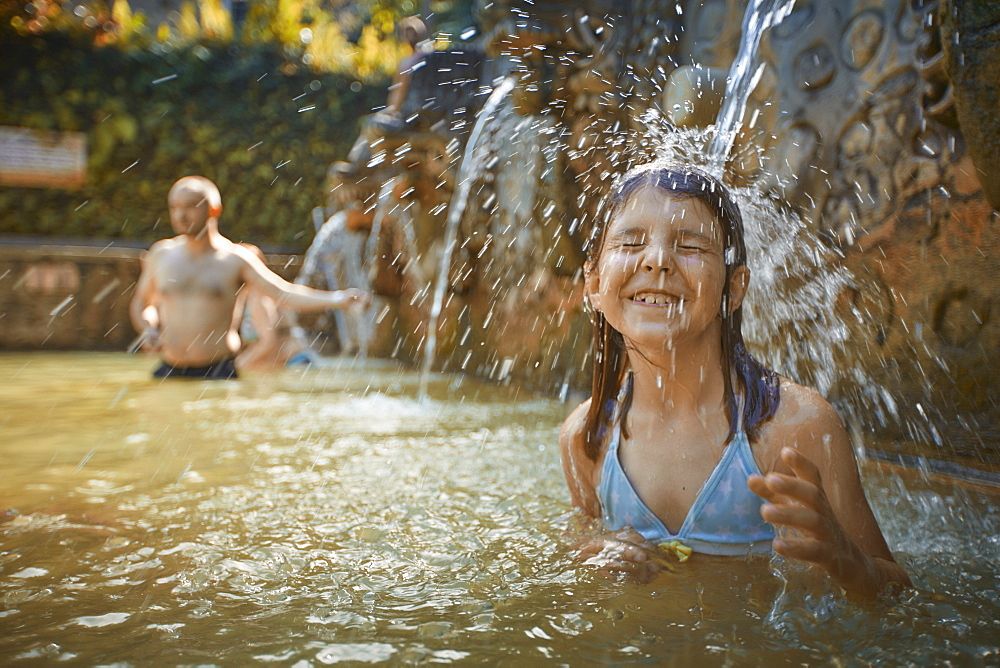 8 year old girl, Hot Springs Air Panas Banjar at Bubunan, Bali, Indonesia