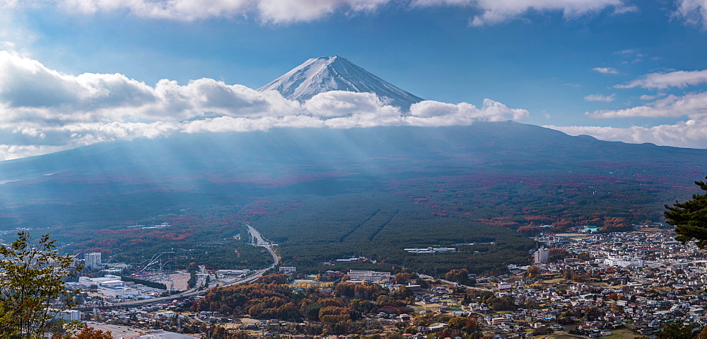 Mt. Fuji with clouds and sunrays in autumn seen from Mt. Kachi, Minamitsuru, Yamanashi Prefecture, Japan