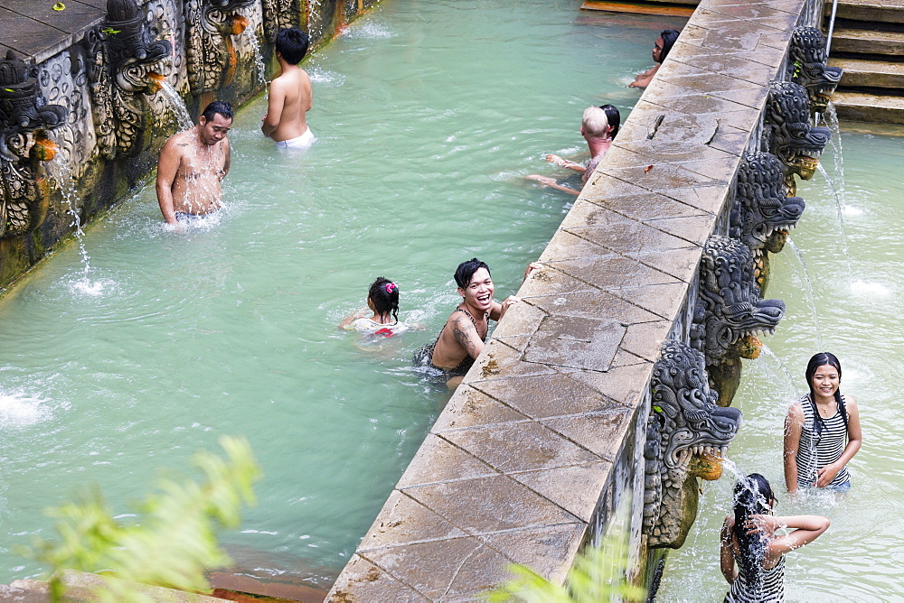 People bathing in hot spring air panas, Banjar Tegeha, Buleleng, Bali, Indonesia