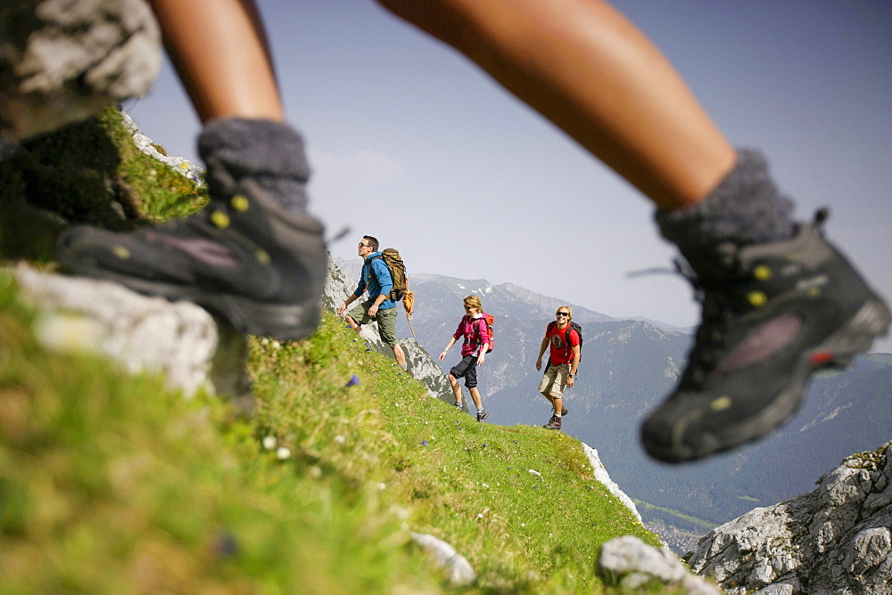 Hikers ascenting, Wetterstein range, Bavaria, Germany