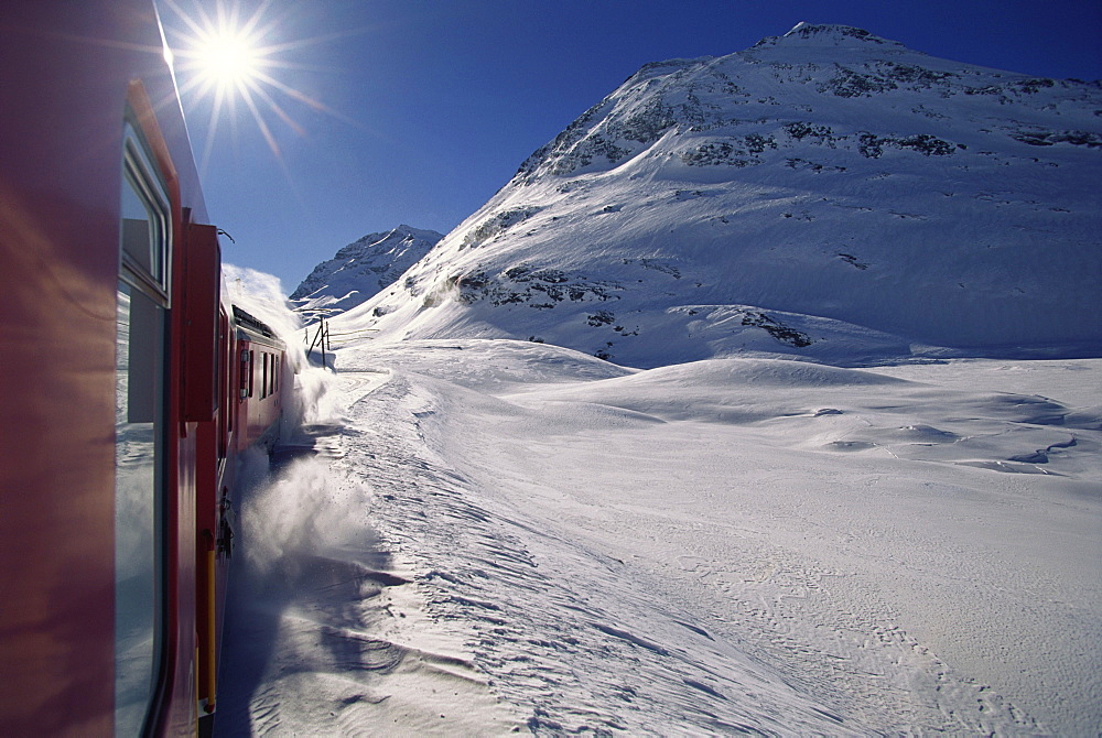 Rhaetian Railway in winter, Engadin, Canton of Grisons, Switzerland