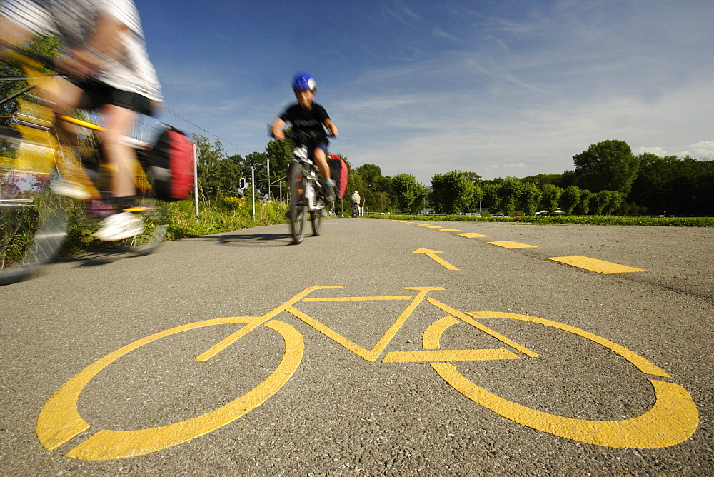 Cyclists passing bikeway, Romanshorn, Canton of Thurgau, Switzerland