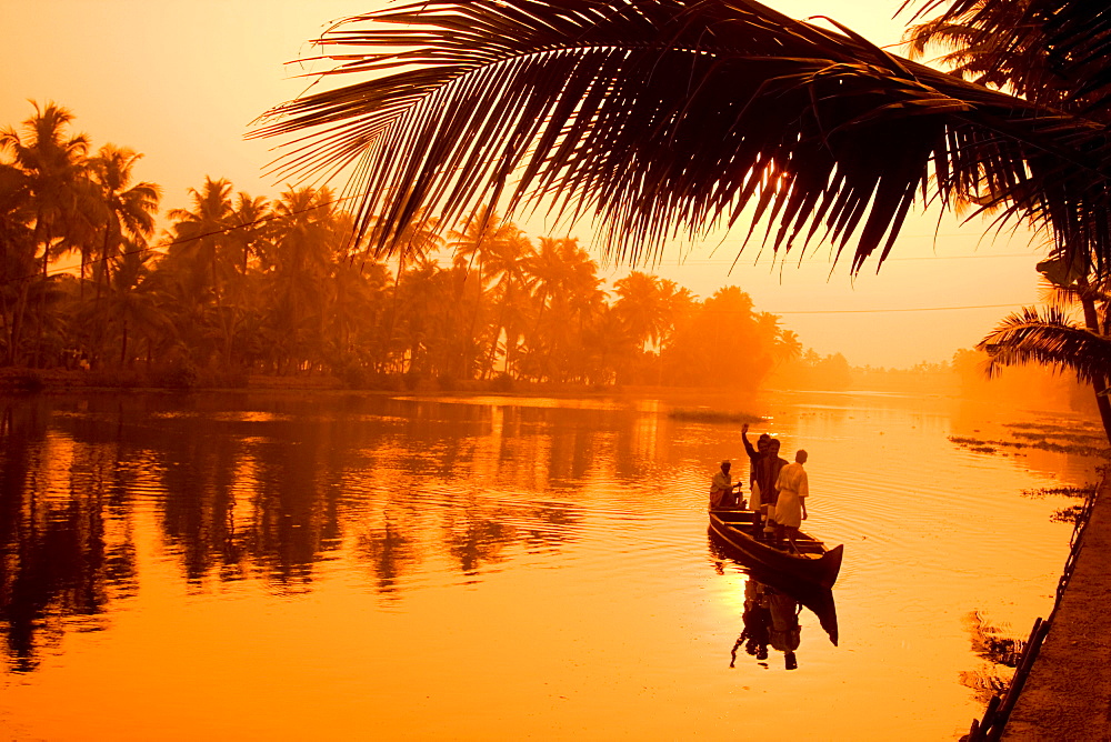 India Kerala backwaters indian people in canoe