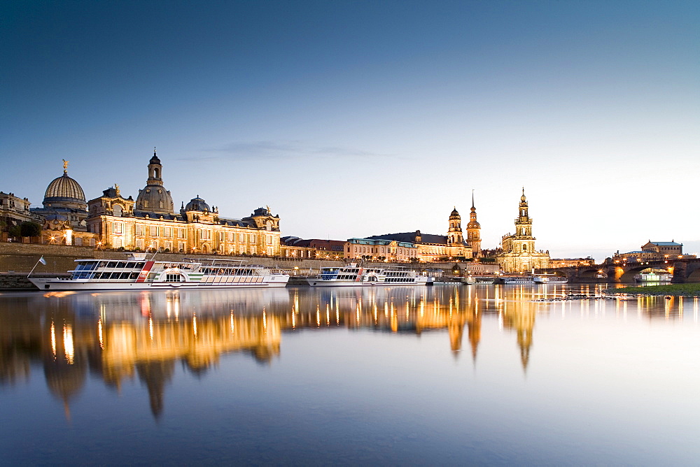 View over river Elbe to Dresden with Bruhl's Terrace, Frauenkirche, Dresden University of Visual Arts, Dresden Castle, Standehaus, Katholische Hofkirche and Semperoper, Dresden, Saxony, Germany