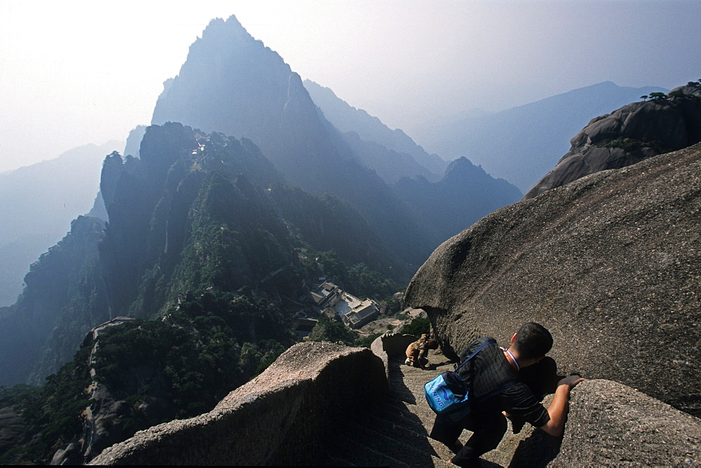 steep rock carved stone steps to Lotus Peak, Huang Shan, Anhui province, steep climb, stone steps, World Heritage, UNESCO, China, Asia