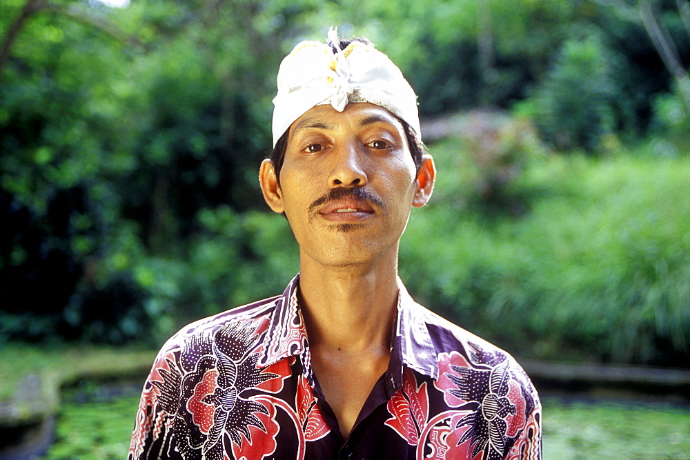 portrait of a balinese temple guide, bali, indonesia