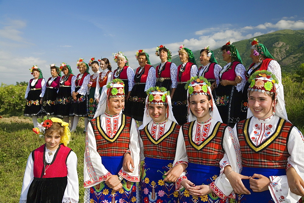 Girls and women in traditional costumes at Rose Festival, Karlovo, Bulgaria, Europe