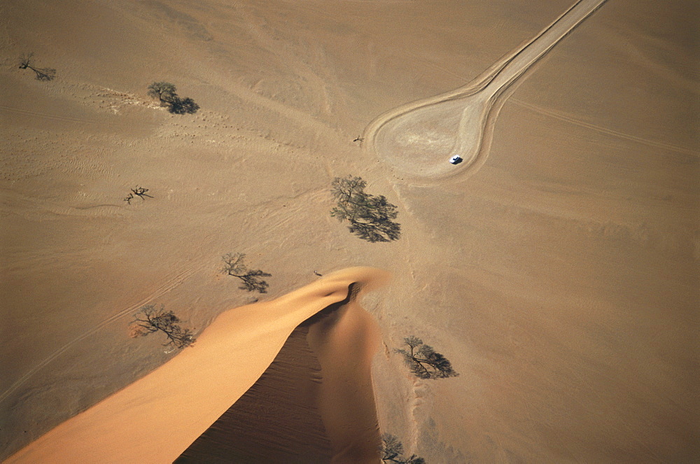 Car at Dune 45, aerial view over Namib Desert, Namibia