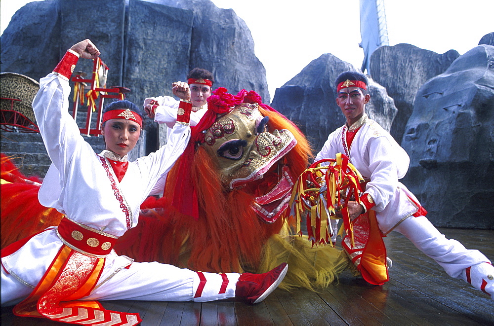 Dragon dance group, people in traditional costumes, Haw Par Villa, Singapore, Asia