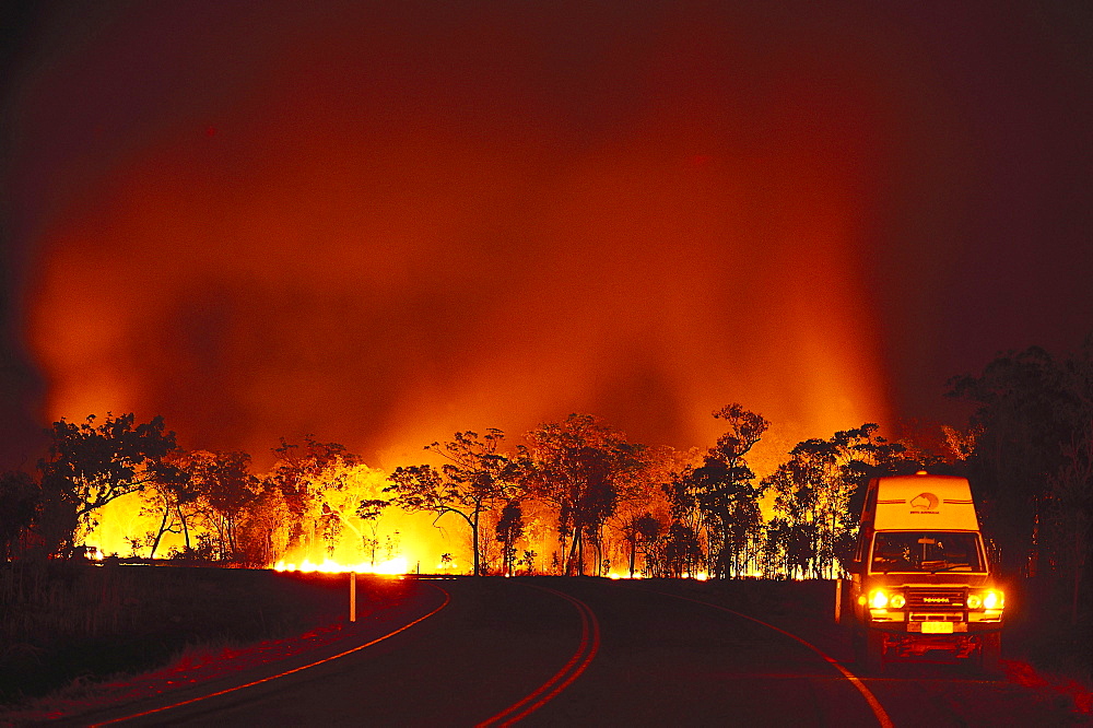 Bush fire at Arnhem Highway at night, Kakadu National Park, Northern Territory, Australia