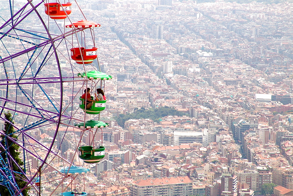 Ferris wheel on Tibidabo mountain with view over the city, Barcelona, Spain, Europe