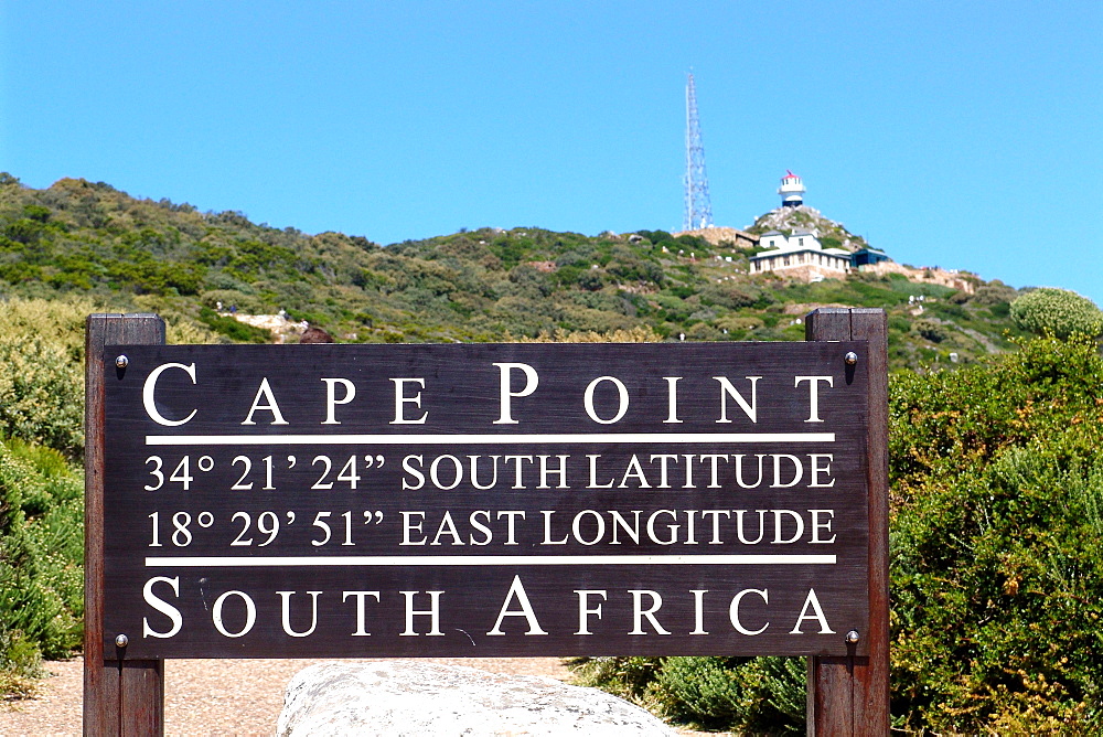 Sign and lighthouse at Cape Point in the sunlight, Cape Town, South Africa, Africa