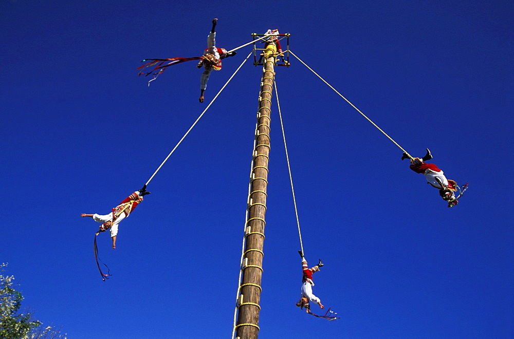 Voladores de Papantia, acrobats hanging on ropes on a fun fair, Veracruz, Mexico, America