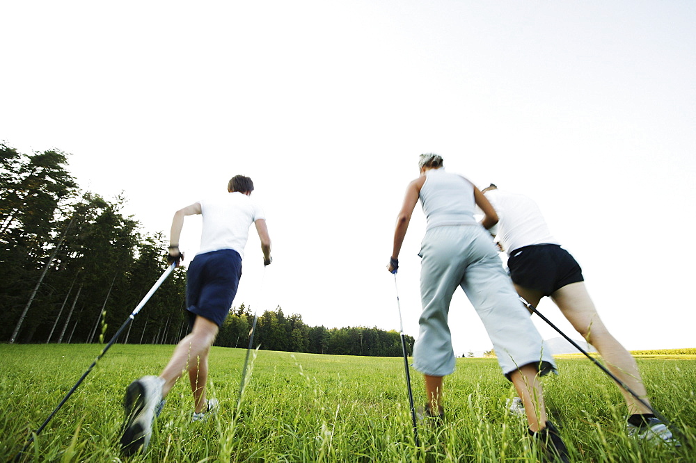 Young people nordic walking