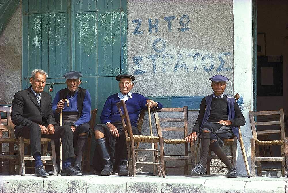 Old men sitting in front of a building, Troodos mountains, Pano Platres, Cyprus, Europe