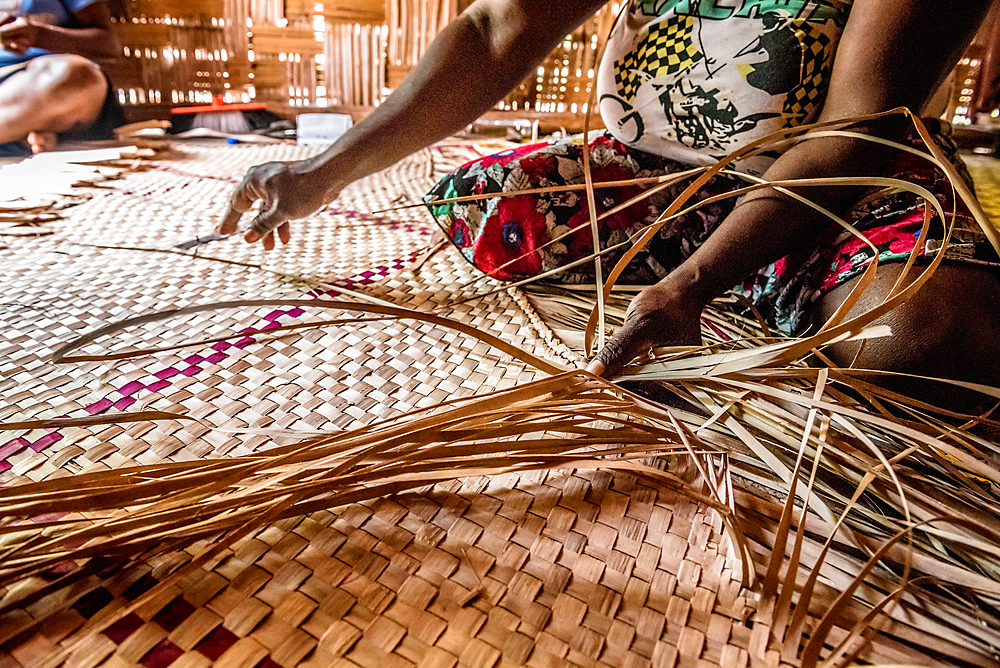 Woman braiding raffia mats, Malekula, Vanuatu, South Pacific, Oceania