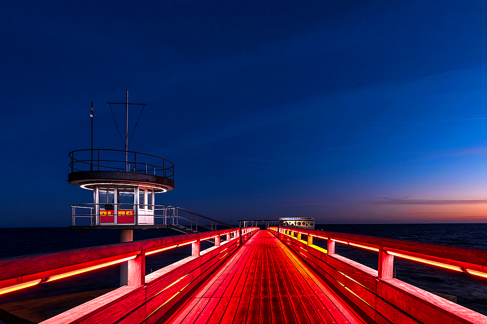 Light illumination of the pier in Kellenhusen at the blue hour, Baltic Sea, Ostholstein, Schleswig-Holstein, Germany