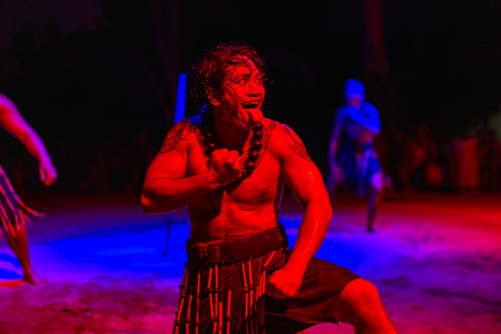 Haka dance performance during the 'Pacifica' show at the Tiki Village cultural center, Moorea, Windward Islands, French Polynesia, South Pacific