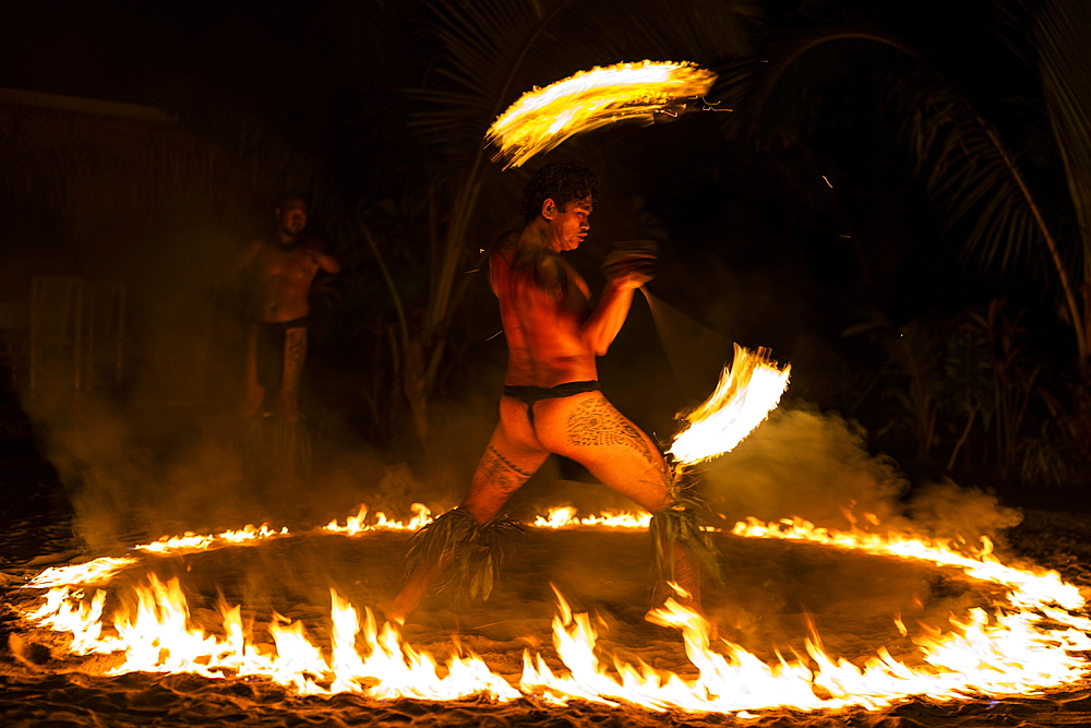 Fire dance during the 'Pacifica' show at the Tiki Village cultural center, Moorea, Windward Islands, French Polynesia, South Pacific