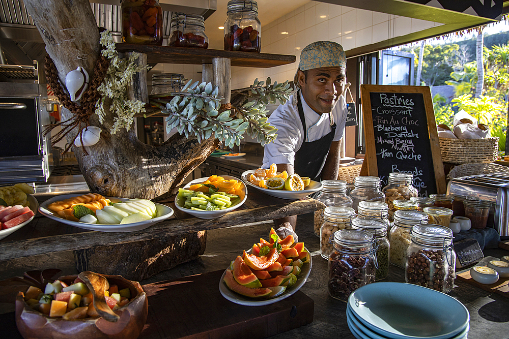 Smiling chef behind a fantastic breakfast buffet in the Tovolea Restaurant of the Six Senses Fiji Resort, Malolo Island, Mamanuca Group, Fiji Islands, South Pacific