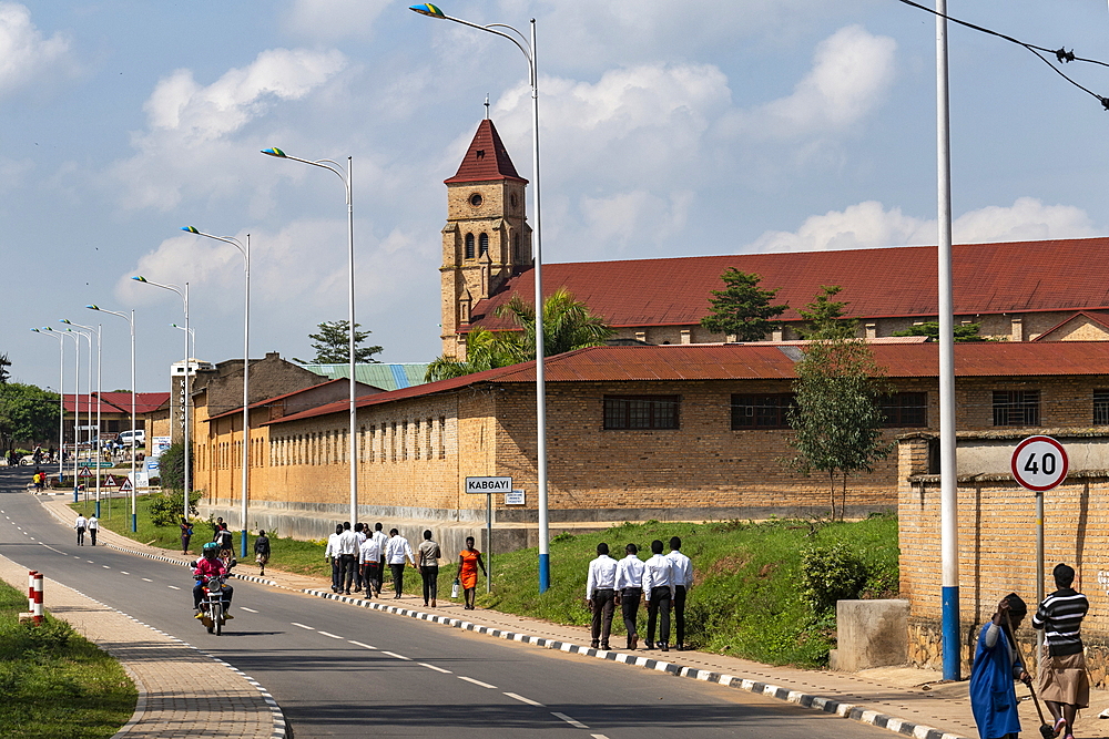 Street scene with young men on their way to church, Kabgayi, Southern Province, Rwanda, Africa