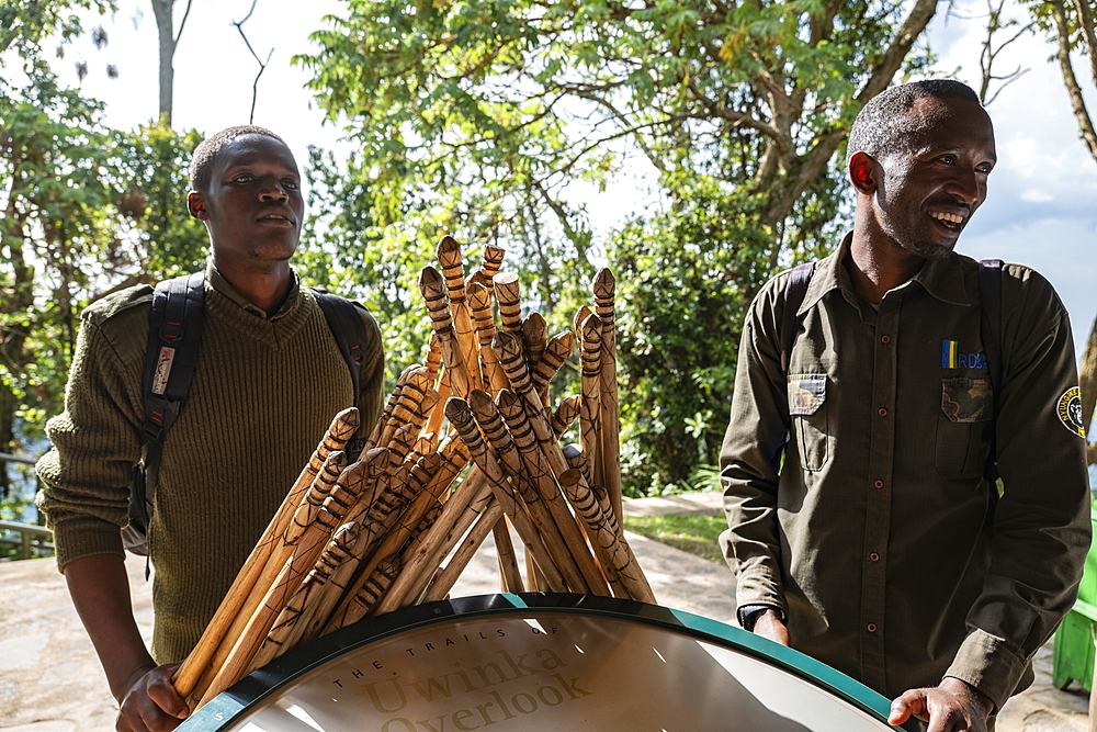 Two ranger guides with walking sticks in preparation for a hike through the jungle to the Canopy Walkway, Nyungwe Forest National Park, Western Province, Rwanda, Africa