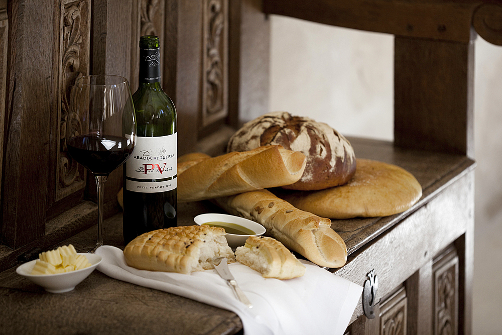 A selection of bread, olive-oil and wine, shot at wineyard, Abadia Retuerta, in Duero Valley, northern Spain.