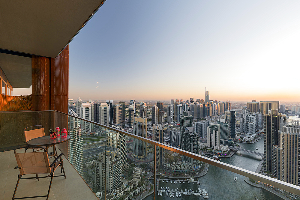 View from an apartment over the Dubai Marina, table with chairs, terrace, Dubai, United Arab Emirates