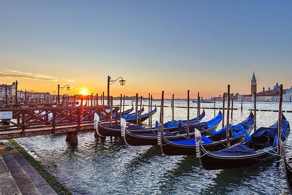 Gondola in front of Riva degli Schiavoni with San Giorgio in the background (right) in Venice, Veneto, Italy