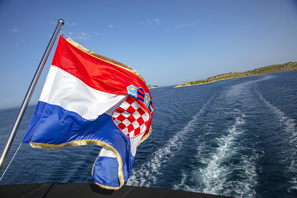 Croatian national flag on board the cruise ship, Kornati Islands National Park, Šibenik-Knin, Croatia, Europe