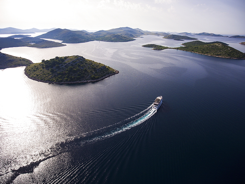 Aerial view of cruise ship in the Adriatic Sea with islands behind, Kornati Islands National Park, Šibenik-Knin, Croatia, Europe