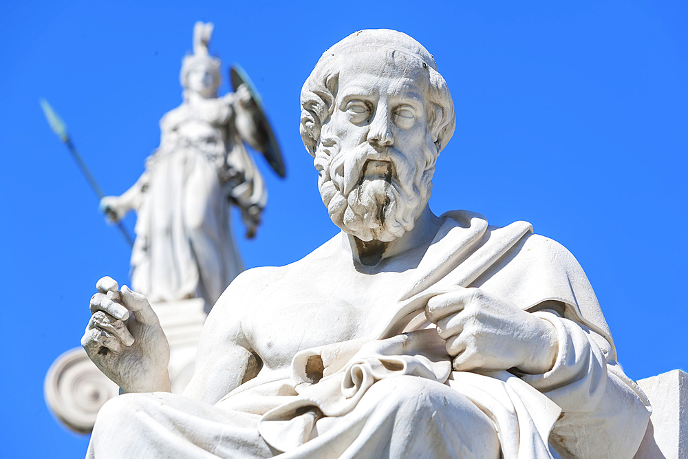 Statues of Socrates and Athena outside Academy of Athens, Athens, Greece,