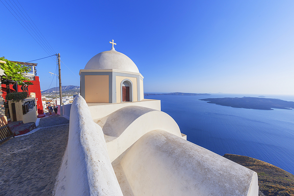 Orthodox church overlooking Santorini caldera, Thira, Santorini, Cyclades Islands, Greece