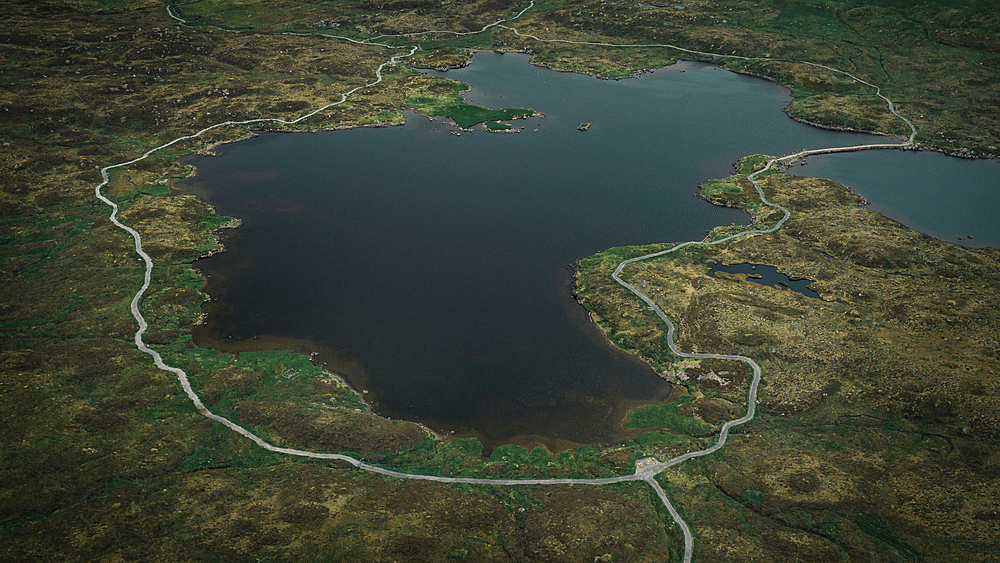 Lake Toftavatn with hiking trail from above, Runavik, Eysteroy, Faroe Islands