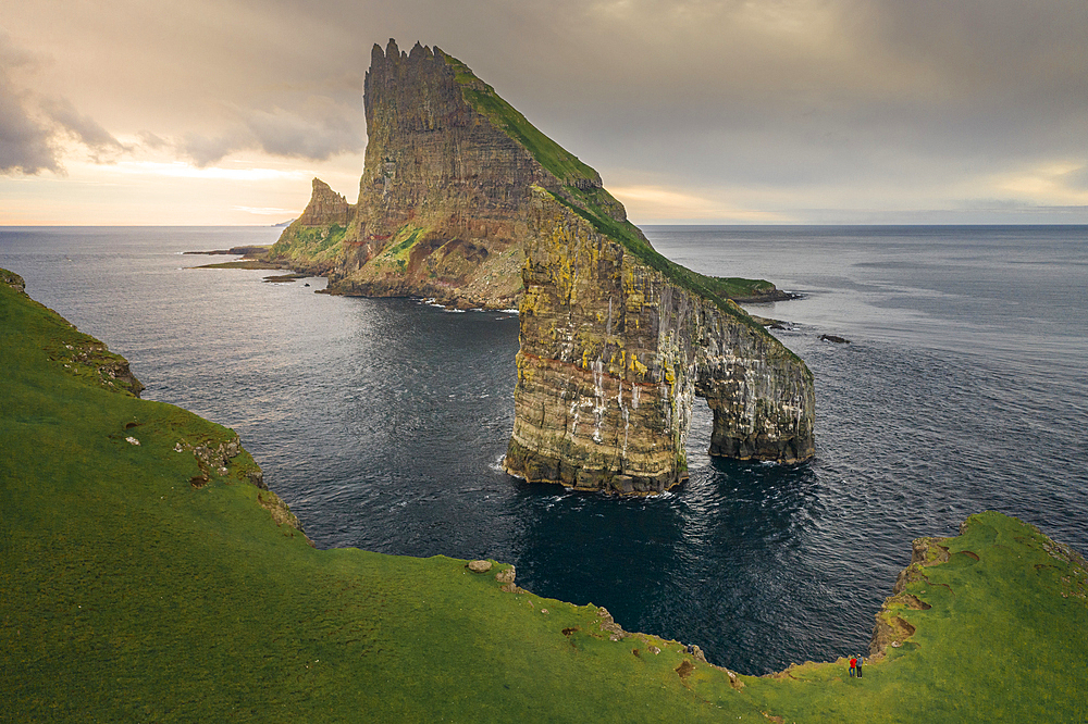 Drangarnier rock formations and Tindholmur island in sunset on Vagar, Faroe Islands