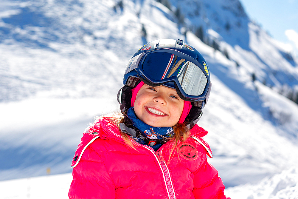 Child having fun in the snow in St. Johann in Tirol, St. Johann, Tirol, Austria