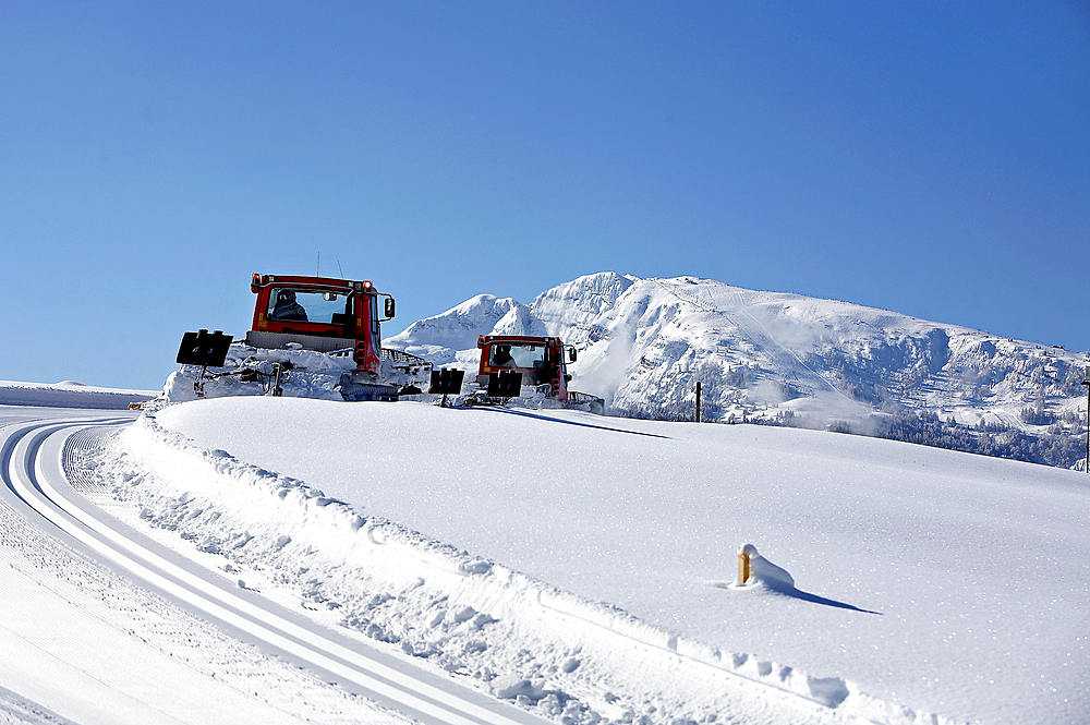 Slope preparation in Reit im Winkl in winter, Chiemgau, Bavaria, Germany