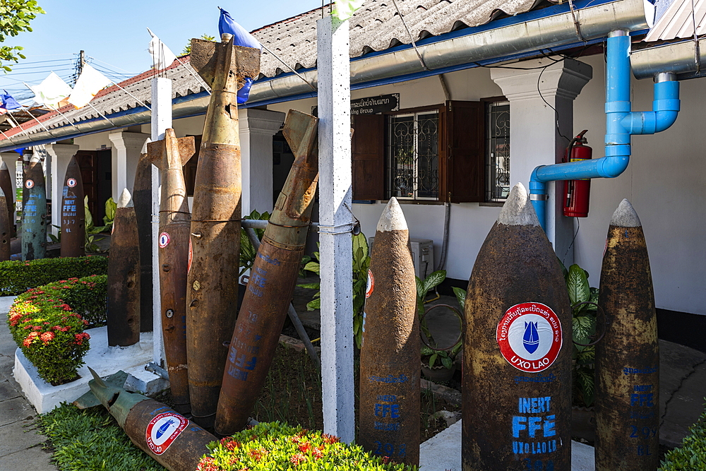 Cartridge casings from unexploded ordnance that fell on Laos during the 2nd Indochina War in the 1970s are exhibited in front of the UXO Laos Information Center, Luang Prabang, Luang Prabang Province, Laos, Asia