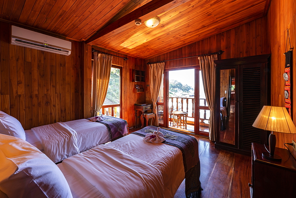 Interior view of a cabin on board the river cruise ship Mekong Sun on the Mekong river, Luang Prabang, Luang Prabang Province, Laos, Asia