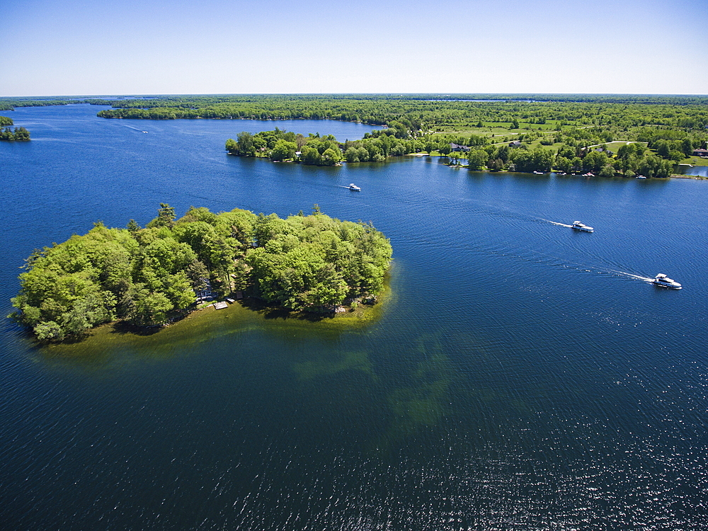 Aerial view of island and three Le Boat Horizon houseboats, Big Rideau Lake, Ontario, Canada, North America