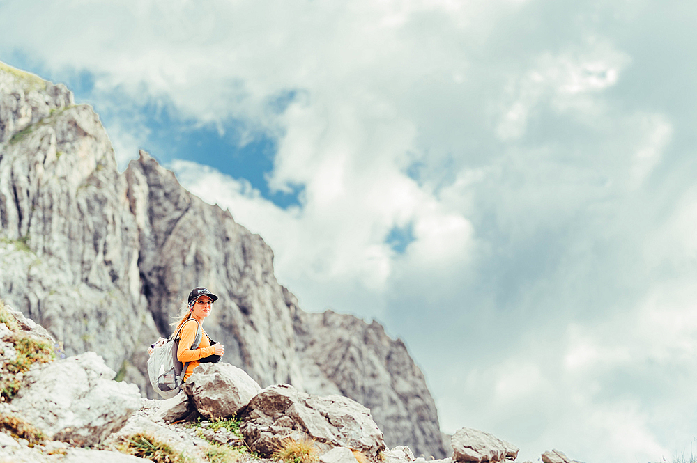 Woman hiking on Lünersee, Vorarlberg, Austria, Europe