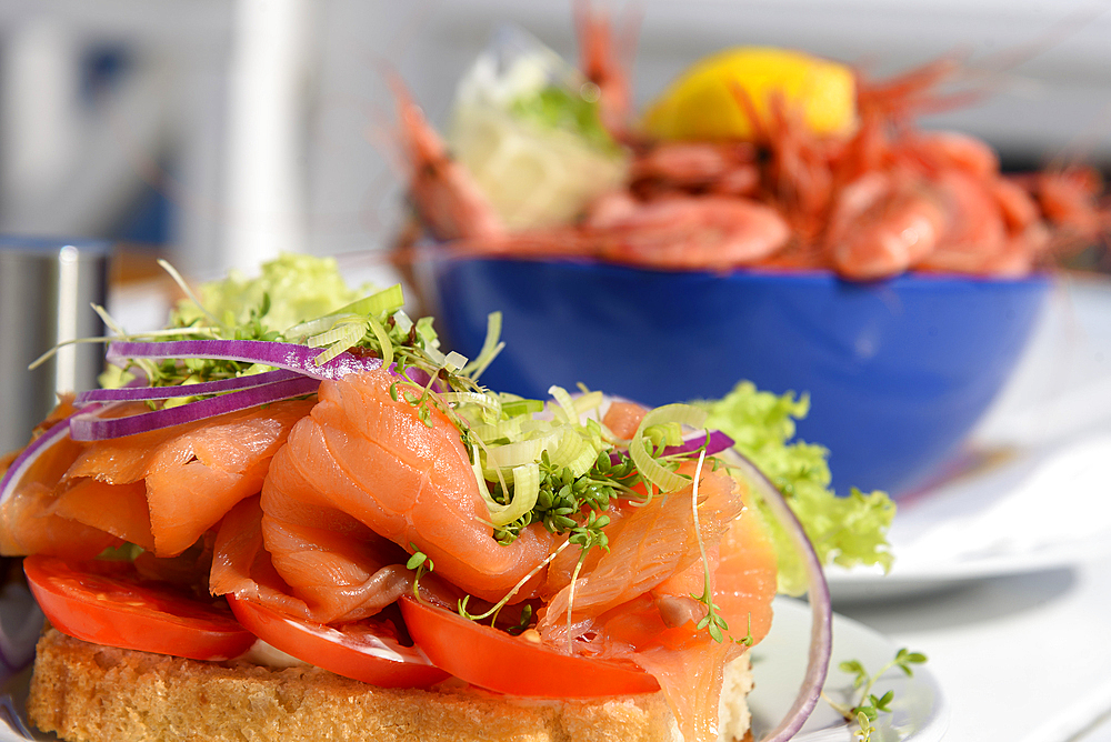 Fresh shellfish as a meal in the Ravnkloa fish hall, Trondheim, Norway