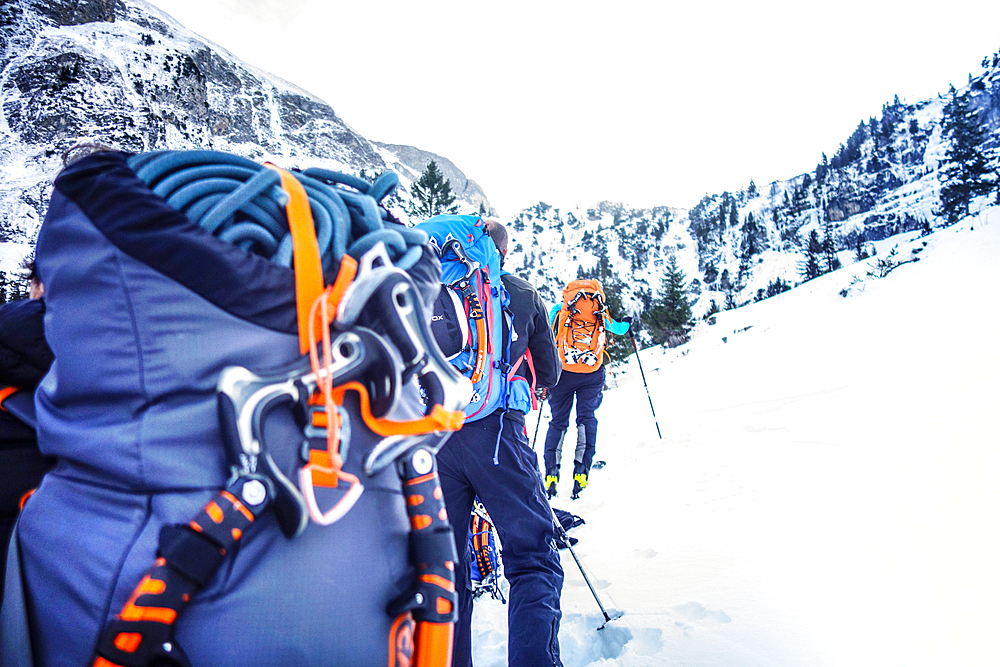 Group of climbers on the ascent to the Traunalpfall, ice climbing training in the Allgäu