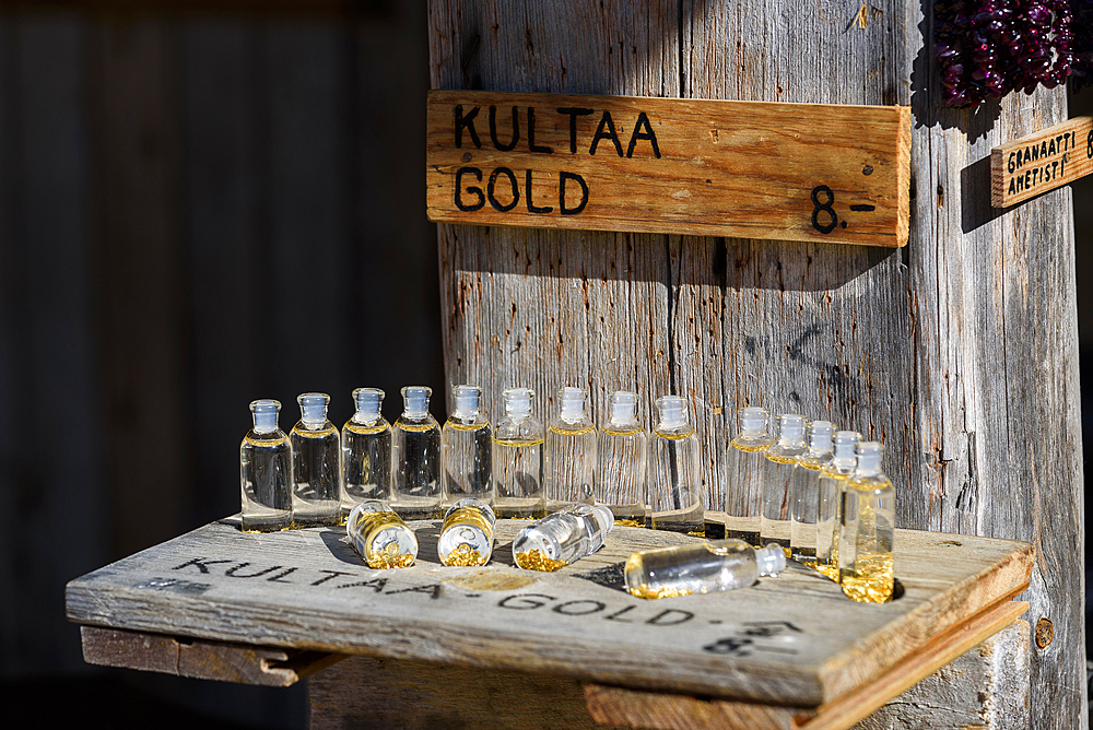 German geologist Kaspar von Wuthenau runs a jewelry stand in gold mining village, Tankavaara, Finland