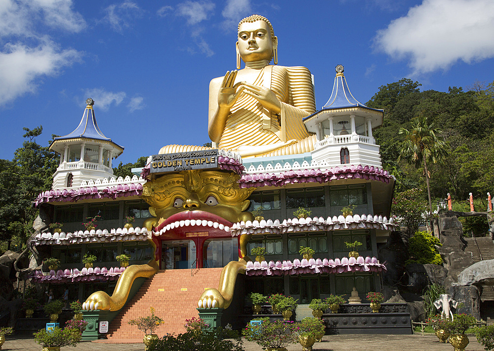 Giant Golden Buddha statue at Dambulla cave temple complex, Sri Lanka, Asia