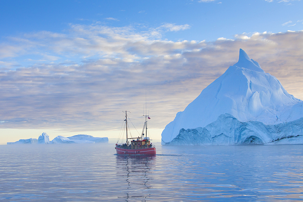 Tourist boat in front of icebergs, Kangia Icefjord, Disko Bay, UNESCO World Heritage Site, West Greenland, Greenland