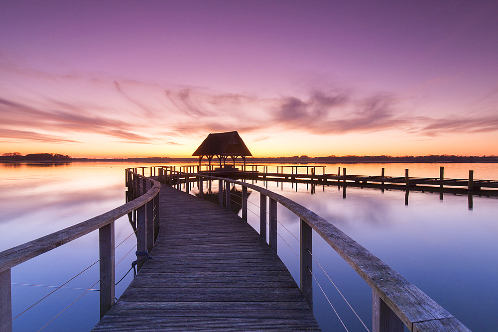 Pier at Hemmelsdorfer See at sunrise, spring, Schleswig-Holstein, Germany