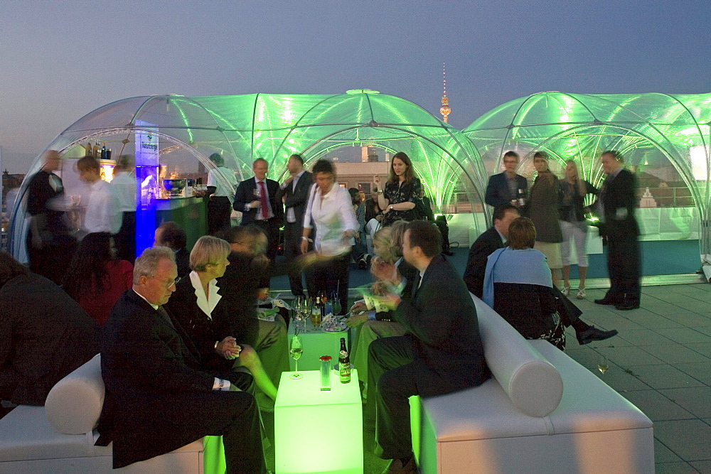 EnBW stands for Energie Baden-Wuerttemberg AG, here is a party on the roof of their headquarters in the Friedrichstrasse, Berlin, Germany