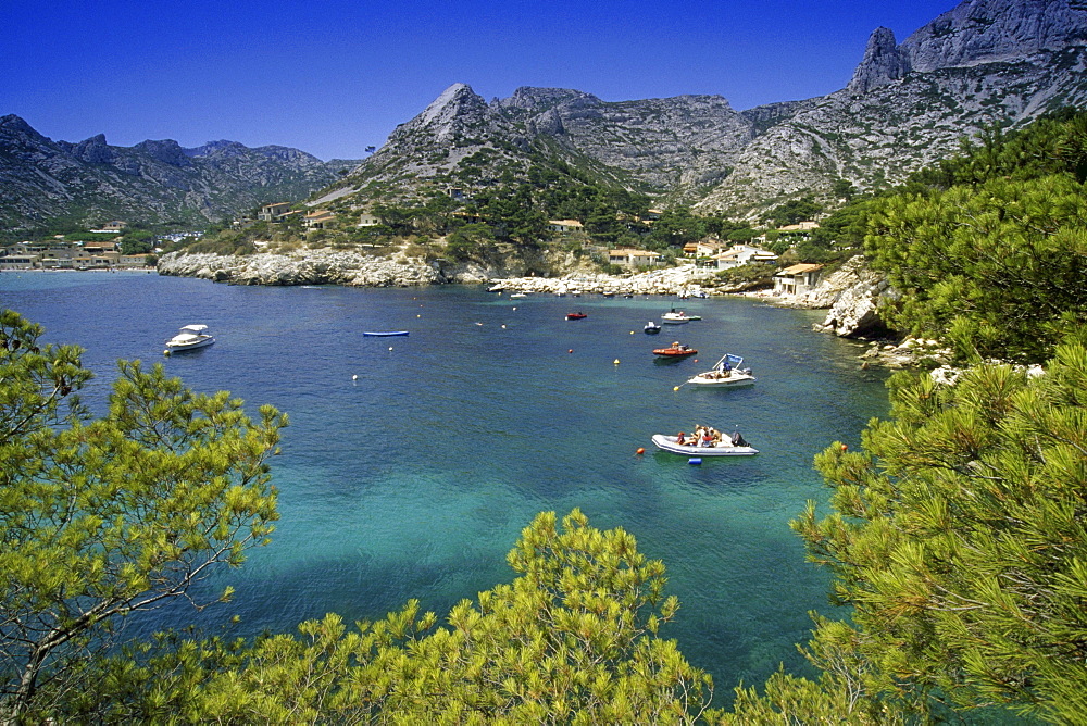 Boats in a small bay under blue sky, Calanque de Sormiou, Cote dÂ¥Azur, Provence, France, Europe